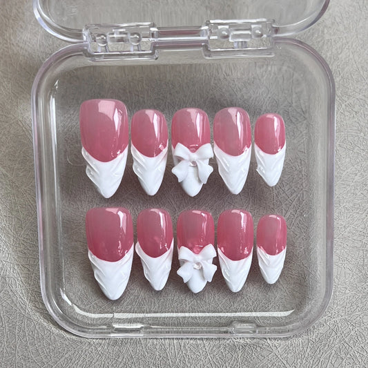 10 uñas postizas francesas blancas hechas a mano con diseños de lazos 3D, uñas postizas a presión en rosa, parches de uñas postizas almendrados desmontables.