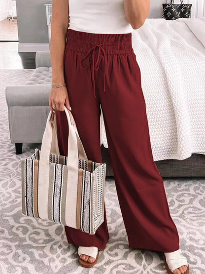 Pantalones casuales holgados de cintura media con cordones y pierna ancha de color liso 