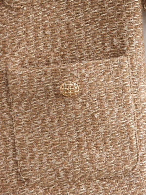 Chaqueta flameada con botones dorados 