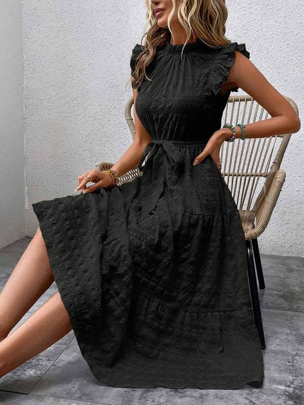 Nuevo vestido texturizado con cordones y mangas voladoras con volantes 