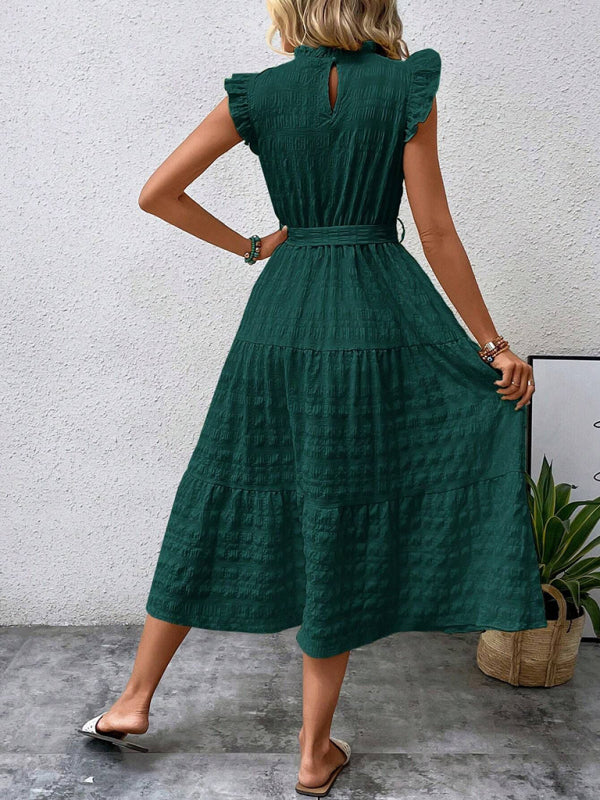 Nuevo vestido texturizado con cordones y mangas voladoras con volantes 