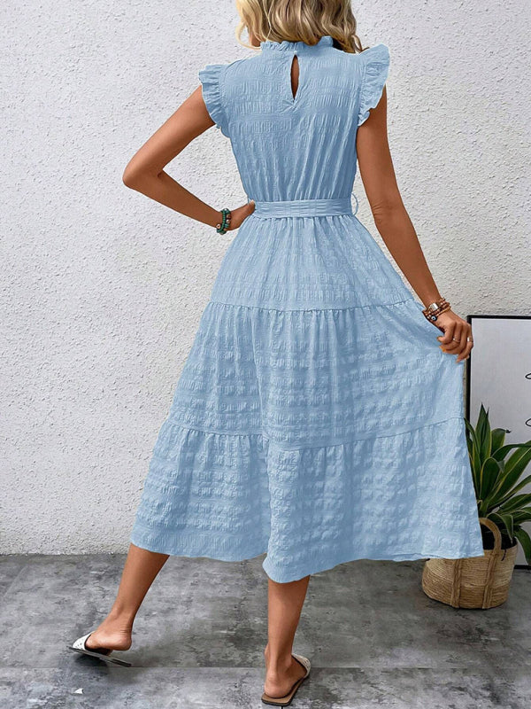 Nuevo vestido texturizado con cordones y mangas voladoras con volantes 