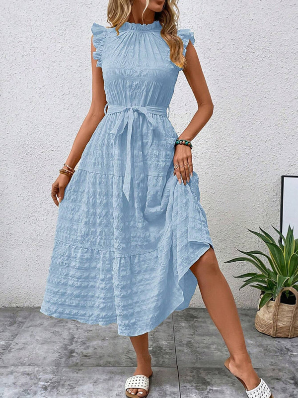 Nuevo vestido texturizado con cordones y mangas voladoras con volantes 
