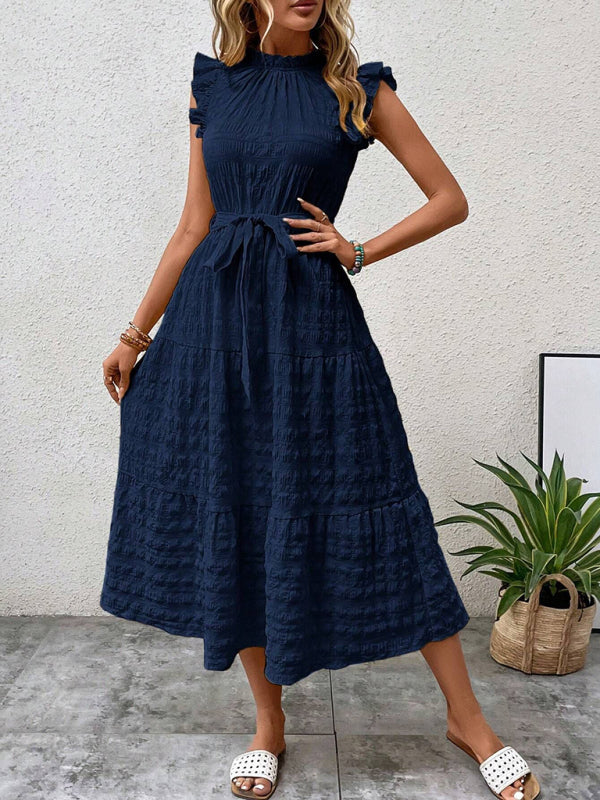 Nuevo vestido texturizado con cordones y mangas voladoras con volantes 