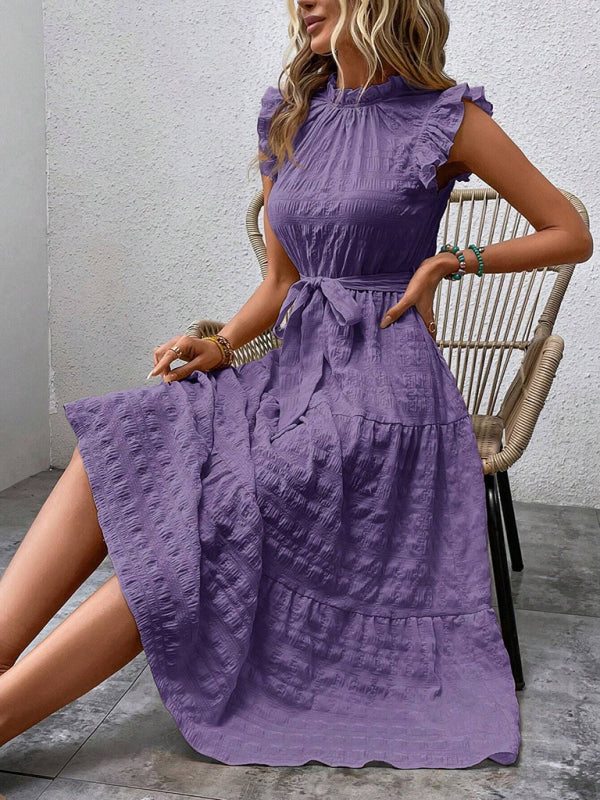 Nuevo vestido texturizado con cordones y mangas voladoras con volantes 