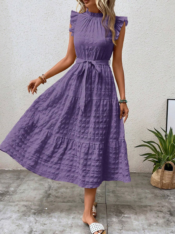 Nuevo vestido texturizado con cordones y mangas voladoras con volantes 