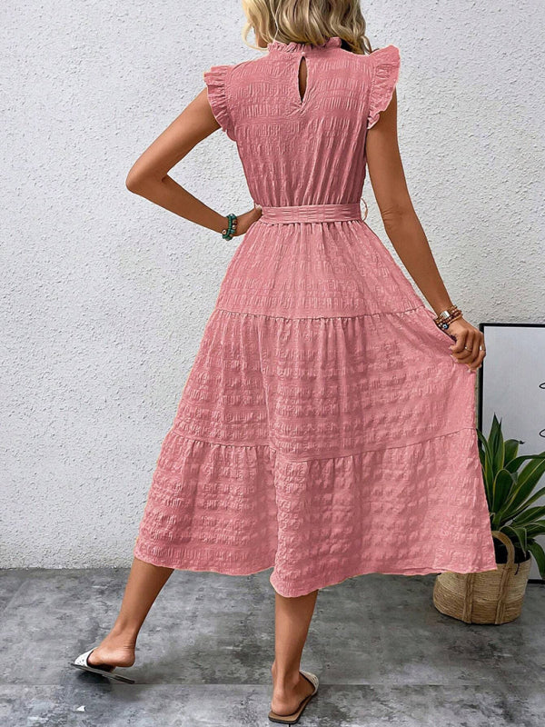 Nuevo vestido texturizado con cordones y mangas voladoras con volantes 