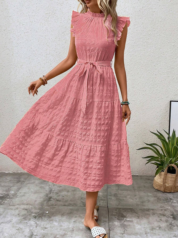 Nuevo vestido texturizado con cordones y mangas voladoras con volantes 