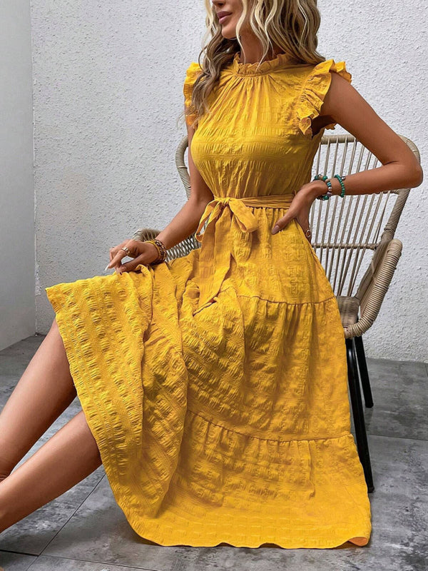 Nuevo vestido texturizado con cordones y mangas voladoras con volantes 