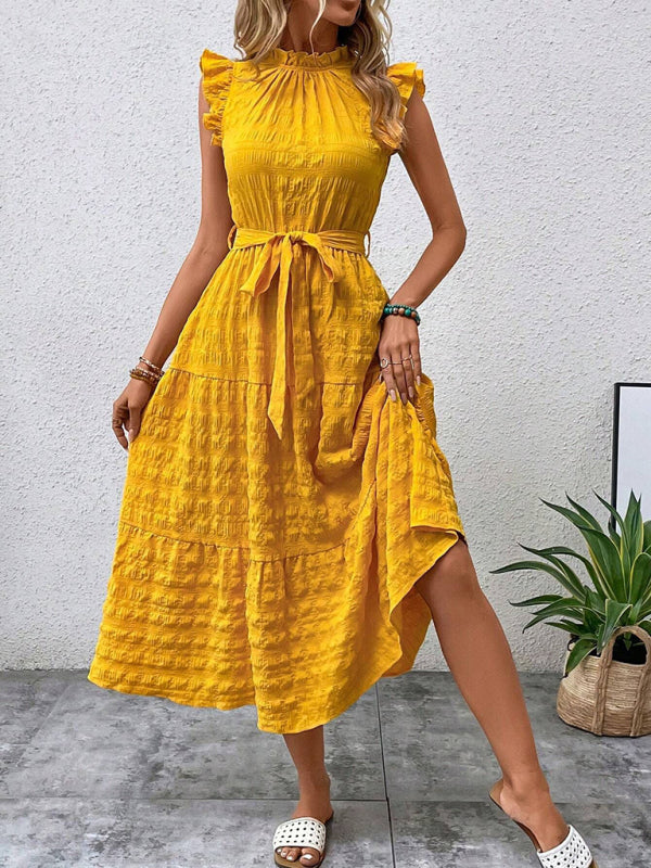 Nuevo vestido texturizado con cordones y mangas voladoras con volantes 